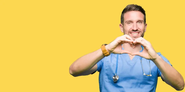 Handsome Doctor Man Wearing Medical Uniform Isolated Background Smiling Love — Stock Photo, Image