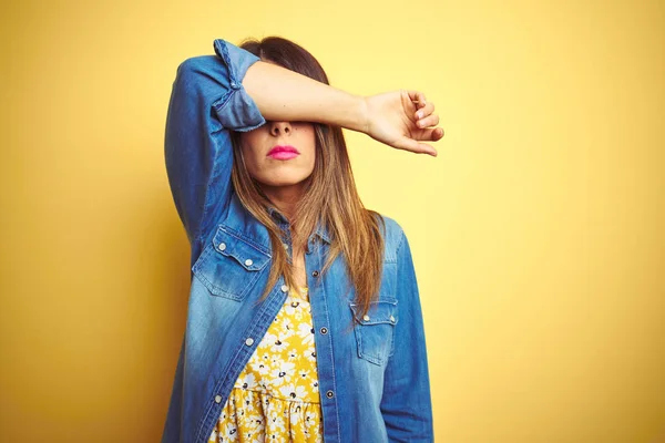 Young Beautiful Woman Standing Yellow Isolated Background Covering Eyes Arm — Stock Photo, Image