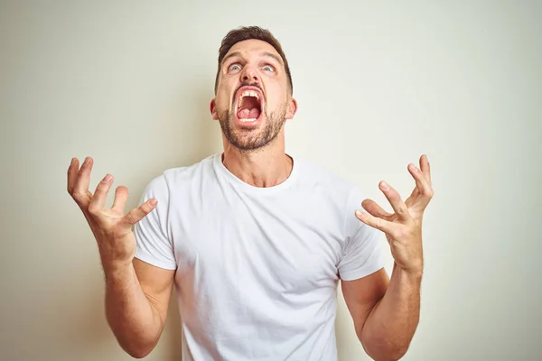 Homem Bonito Jovem Vestindo Casual Shirt Branca Sobre Fundo Isolado — Fotografia de Stock