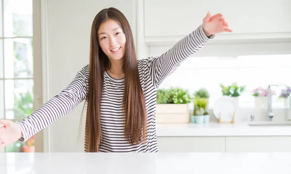 Beautiful Asian Woman Wearing Stripes Sweater Looking Camera Smiling Open Stock Photo