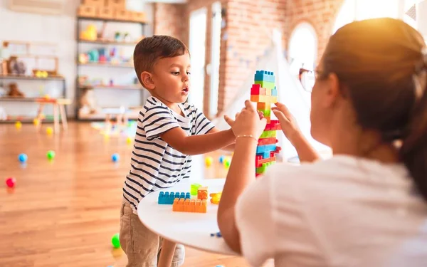 Beautiful Teacher Toddler Boy Playing Construction Blocks Bulding Tower Kindergarten — Stock Photo, Image