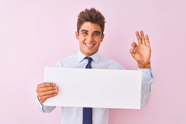 Young Handsome Businessman Holding Banner Standing Isolated Pink Background Doing — Stock Photo, Image
