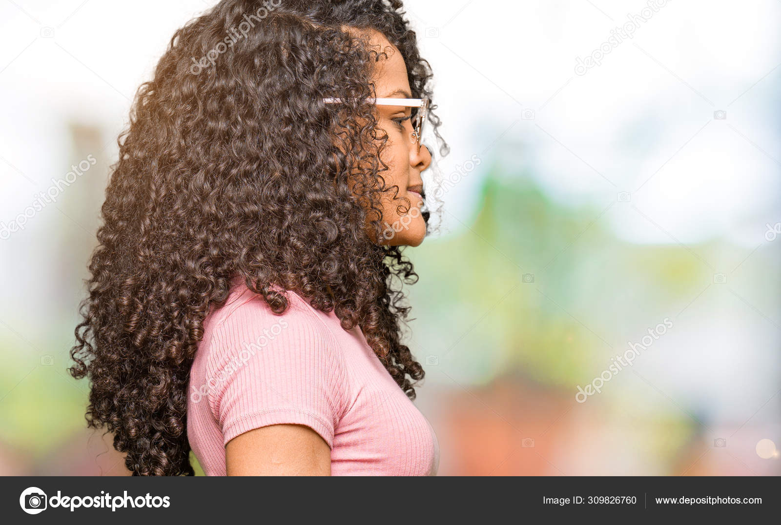 Young Beautiful Woman Curly Hair Wearing Pink Sunglasses Looking