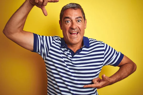 Handsome Middle Age Man Wearing Striped Polo Standing Isolated Yellow — Φωτογραφία Αρχείου