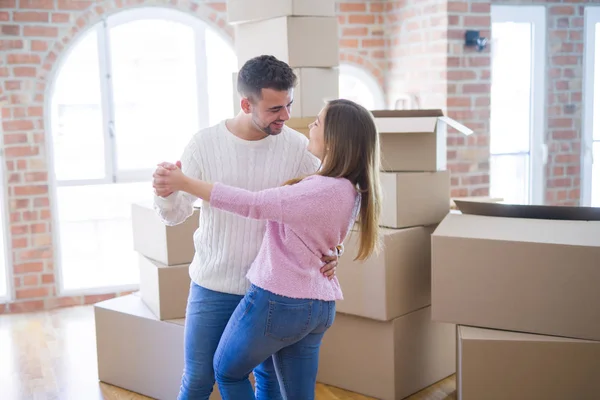 Young Beautiful Couple Love Celebrating Dancing Moving New Home Smiling — Stock Photo, Image