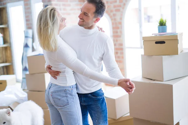 Young Beautiful Couple Dog Dancing New Home Cardboard Boxes — Stock Photo, Image
