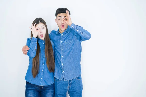 Beautiful Young Asian Couple White Isolated Background Doing Gesture Shocked — Stock Photo, Image