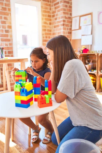 Beautiful Teacher Toddler Girl Playing Construction Blocks Bulding Tower Kindergarten — Stock Photo, Image