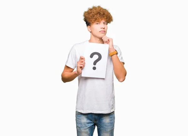 Young Handsome Man Holding Paper Question Mark Serious Face Thinking — Stock Photo, Image