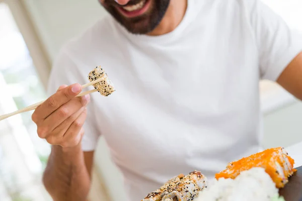 Handsome Man Smiling Happy Enjoying Eating Fresh Colorful Asian Sushi — Stock Photo, Image