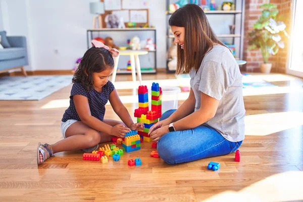 Beautiful Teacher Toddler Girl Playing Construction Blocks Bulding Tower Kindergarten — Stock Photo, Image