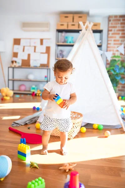 Adorable Toddler Playing Building Blocks Lots Toys Kindergarten — Stock Photo, Image