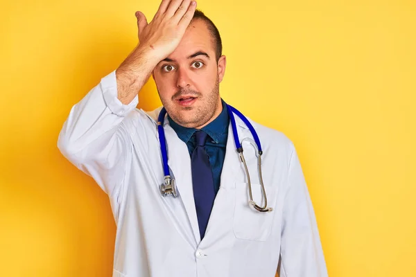 Young Doctor Man Wearing Coat Stethoscope Standing Isolated Yellow Background — Stock Photo, Image