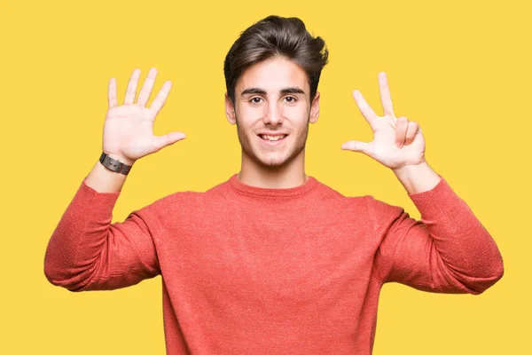 Молодий Красивий Чоловік Над Ізольованим Тлом Показуючи Вказуючи Пальцями Номер — стокове фото