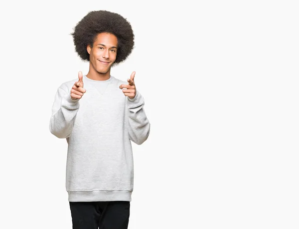 Young African American Man Afro Hair Wearing Sporty Sweatshirt Pointing — Stock Photo, Image