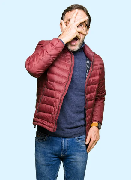 Middle Age Handsome Man Wearing Glasses Winter Coat Peeking Shock — Stock Photo, Image