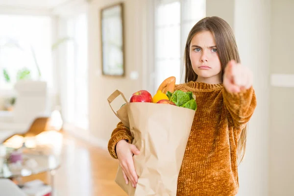 Beautiful Young Girl Holding Paper Bag Fresh Groceries Pointing Finger — Stock Photo, Image