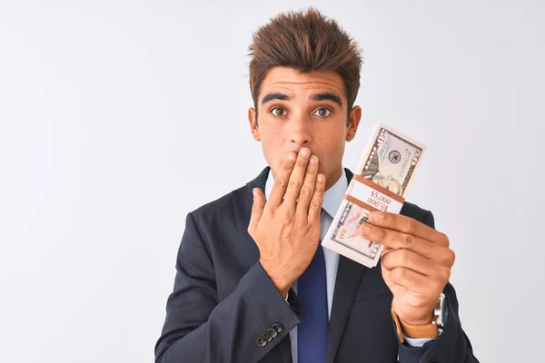 Joven Hombre Negocios Guapo Vistiendo Traje Sosteniendo Dólares Sobre Aislado —  Fotos de Stock