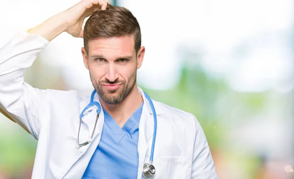 Handsome Doctor Man Wearing Medical Uniform Isolated Background Confuse Wonder — Stock Photo, Image