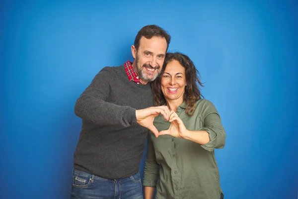 Beautiful Middle Age Couple Together Standing Isolated Blue Background Smiling — Stock Photo, Image