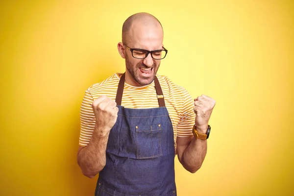 Young Bartender Man Wearing Barista Apron Working Professional Yellow Background — Stock Photo, Image