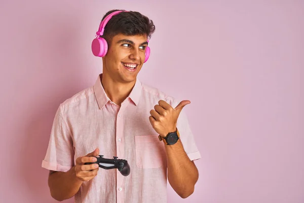 Indian Gamer Man Playing Video Game Using Headphones Isolated Pink — Stock Photo, Image