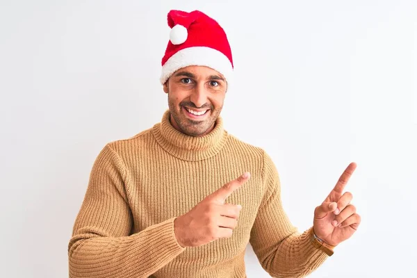 Jonge Knappe Man Met Kerst Coltrui Geïsoleerde Achtergrond Glimlachend Kijkend — Stockfoto