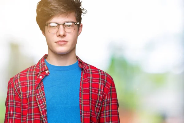 Młody Przystojny Student Człowiek Okularach Białym Tle Poważną Miną Twarzy — Zdjęcie stockowe