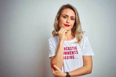 Beautiful woman wearing sacarstic comments loading t-shirt over isolated background thinking looking tired and bored with depression problems with crossed arms. clipart