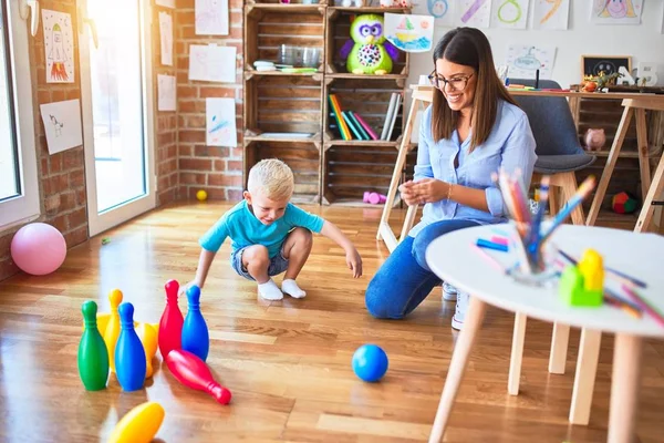 Young Caucasian Child Playing Playschool Teacher Mother Son Playing Bowling — Stock Photo, Image
