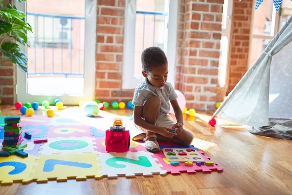 Beautiful African American Toddler Playing Maths Game Using Numbers Kindergarten — Stockfoto