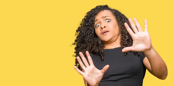 Young Beautiful Woman Curly Hair Afraid Terrified Fear Expression Stop — Stock Photo, Image