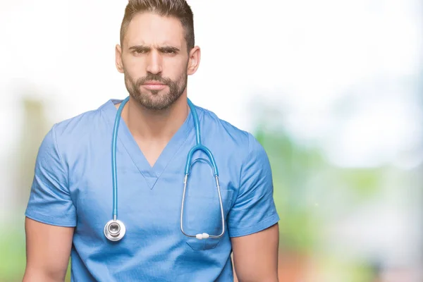 Handsome Young Doctor Surgeon Man Isolated Background Skeptic Nervous Frowning — Stock Photo, Image