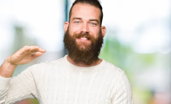 Young Hipster Man Wearing Winter Sweater Gesturing Hands Showing Big — Stock Photo, Image