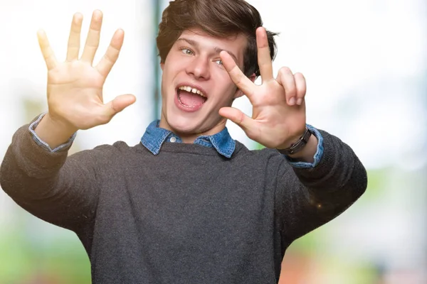 Joven Hombre Elegante Guapo Sobre Fondo Aislado Mostrando Apuntando Hacia —  Fotos de Stock