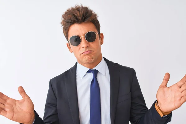 Young Handsome Businessman Wearing Suit Sunglasses Isolated White Background Clueless — Stock Photo, Image