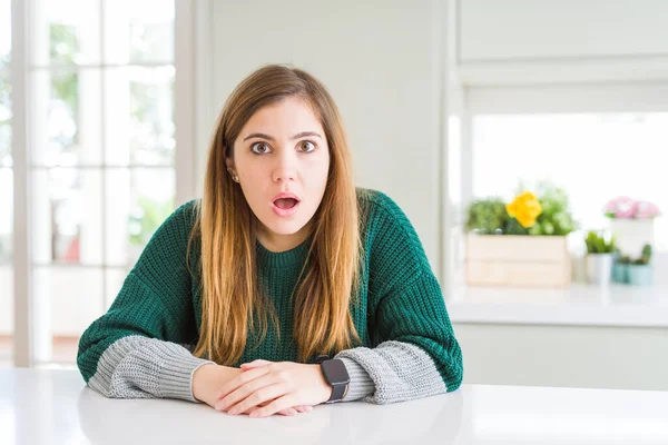 Young Beautiful Size Woman Wearing Casual Striped Sweater Afraid Shocked — Stock Photo, Image