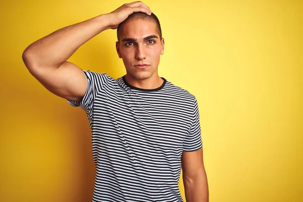 Young Handsome Man Wearing Striped Shirt Yellow Isolated Background Confuse — Stock Photo, Image