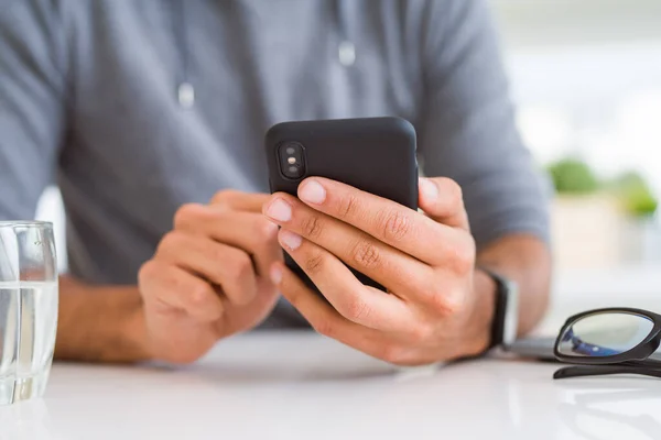 Close up of man using smartphone — Stock Photo, Image