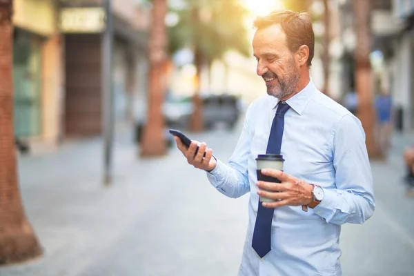 Middle Age Handsome Businessman Using Smartphone Drinking Take Away Coffee — 图库照片