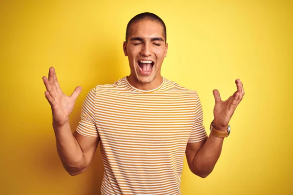 Young Handsome Man Wearing Striped Shirt Yellow Isolated Background Celebrating — Stock Photo, Image