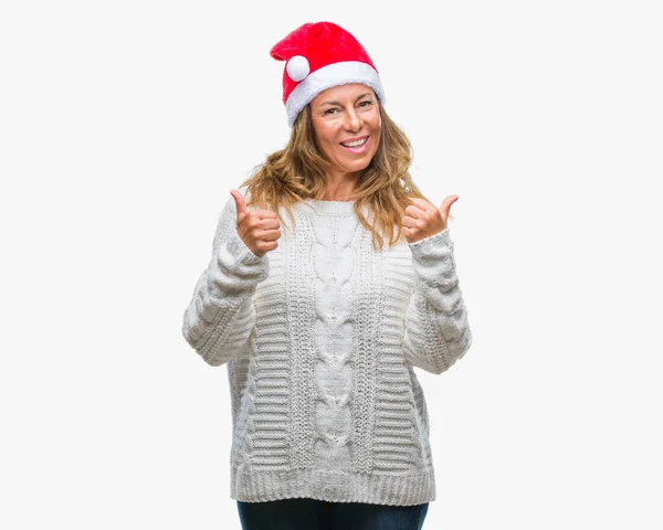 Mulher Hispânica Meia Idade Usando Chapéu Natal Sobre Sinal Sucesso — Fotografia de Stock
