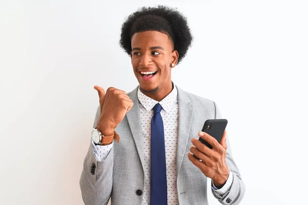 Young African American Businessman Using Smartphone Isolated White Background Pointing — Stockfoto