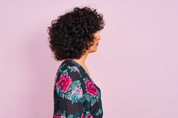 Young Arab Woman Curly Hair Wearing Floral Dress Isolated Pink — Stockfoto