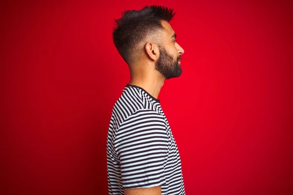 Young Handsome Indian Man Wearing Navy Striped Shirt Isolated Red — 스톡 사진