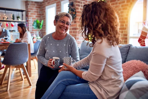 Women Speaking Smiling Happy Sitting Sofa Drinking Cup Coffe Celebrating — Stock Photo, Image