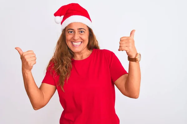 Middelbare Leeftijd Volwassen Vrouw Dragen Kerstmuts Geïsoleerde Achtergrond Succes Teken — Stockfoto