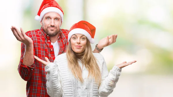 Giovane Coppia Innamorata Indossa Cappello Natale Sfondo Isolato Espressione Indiscreta — Foto Stock