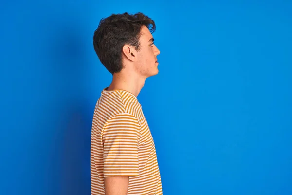 Teenager Boy Wearing Casual Shirt Standing Blue Isolated Background Looking — Stock Photo, Image