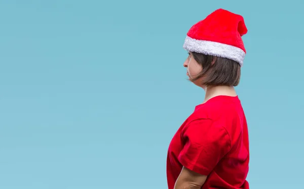 Junge Erwachsene Frau Mit Syndrom Trägt Weihnachtsmütze Über Isoliertem Hintergrund — Stockfoto